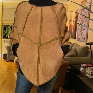 Beautiful UGG Cameral fur leather cape NWOT.